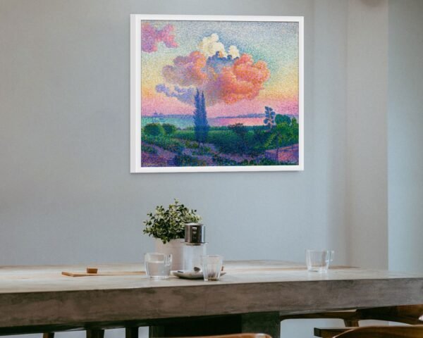 The Pink Cloud white framed art print over coffee table