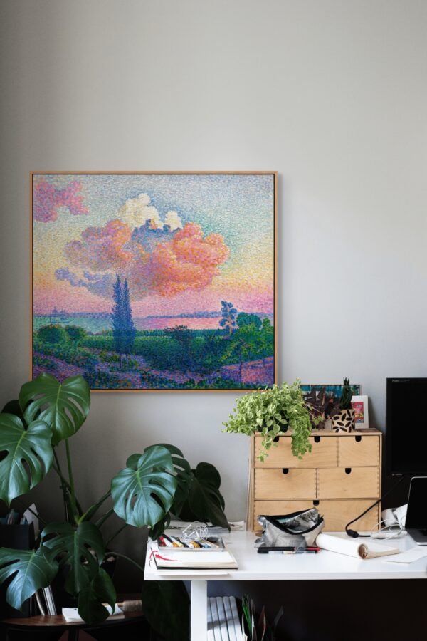 The Pink Cloud framed art print in offce with desk and plant